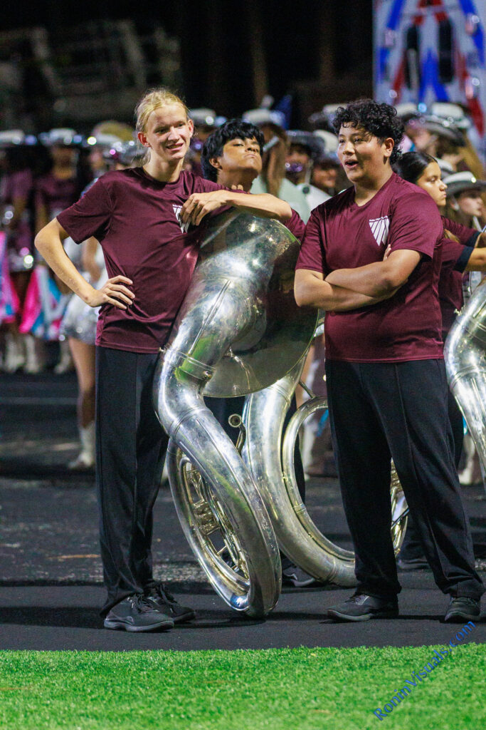 Wyatt King (left) relaxes with Omar Hernandez before the halftime show in Conroe, Sept. 11., 2026. (Waller Sentinel photo courtesy Creighton Holub, Ronin Visuals)
