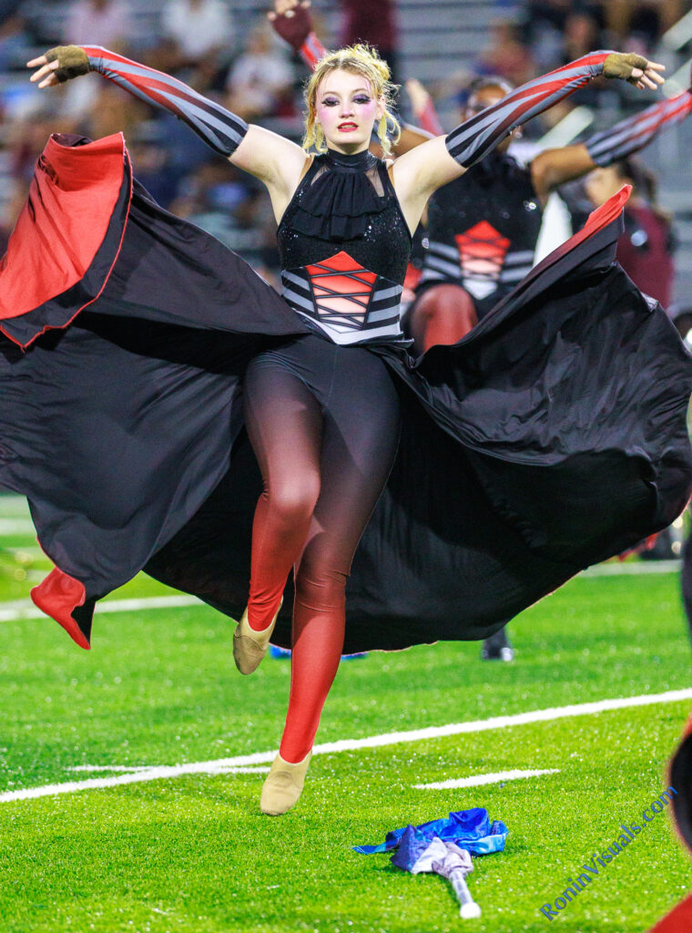 The Waller High School color guard member performs during the halftime show of the third game of the season, at Conroe's Buddy Moorhead Stadium, on Sept. 11, 2026. (Waller Sentinel photo courtesy Creighton Holub, Ronin Visuals)