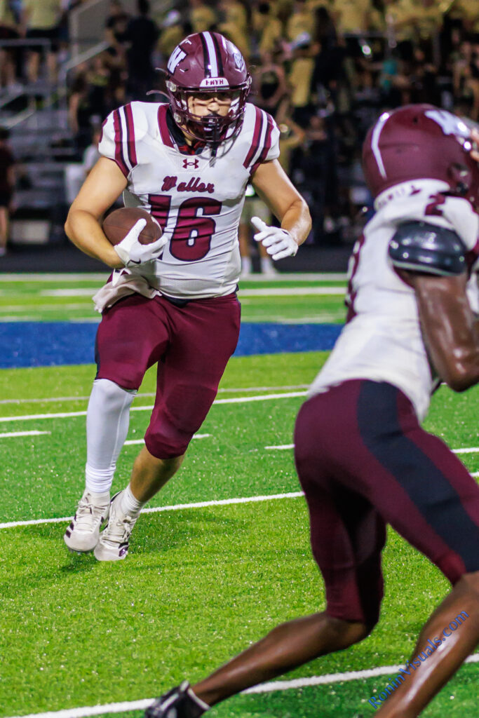 Kyle Bice (16) brings a pass in for a 33-yard touchdown catch during the third game of the season. (Waller Sentinel photo courtesy Creighton Holub, Ronin Visuals)